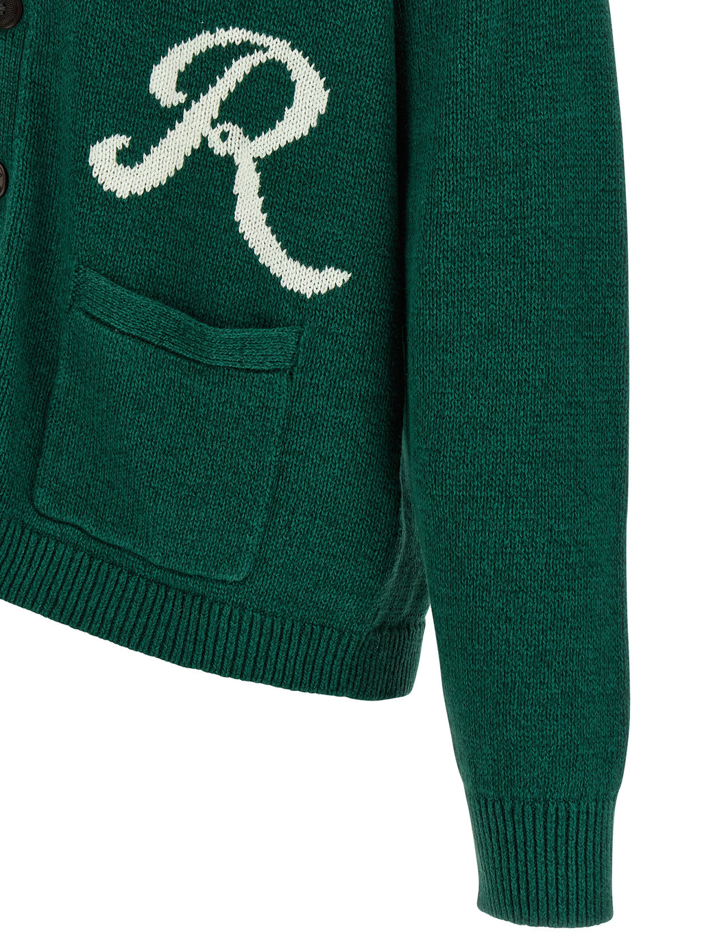 Cardigan bicolore en lin de Polo Ralph Lauren, détails en maille, porté avec col en V et boutons.