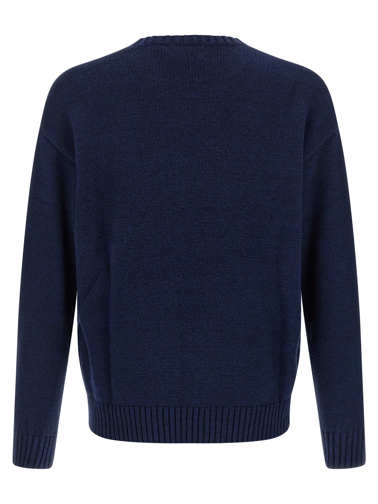 Cardigan en lin bleu Polo Ralph Lauren porté, détail du col et des boutons, style décontracté et élégant.