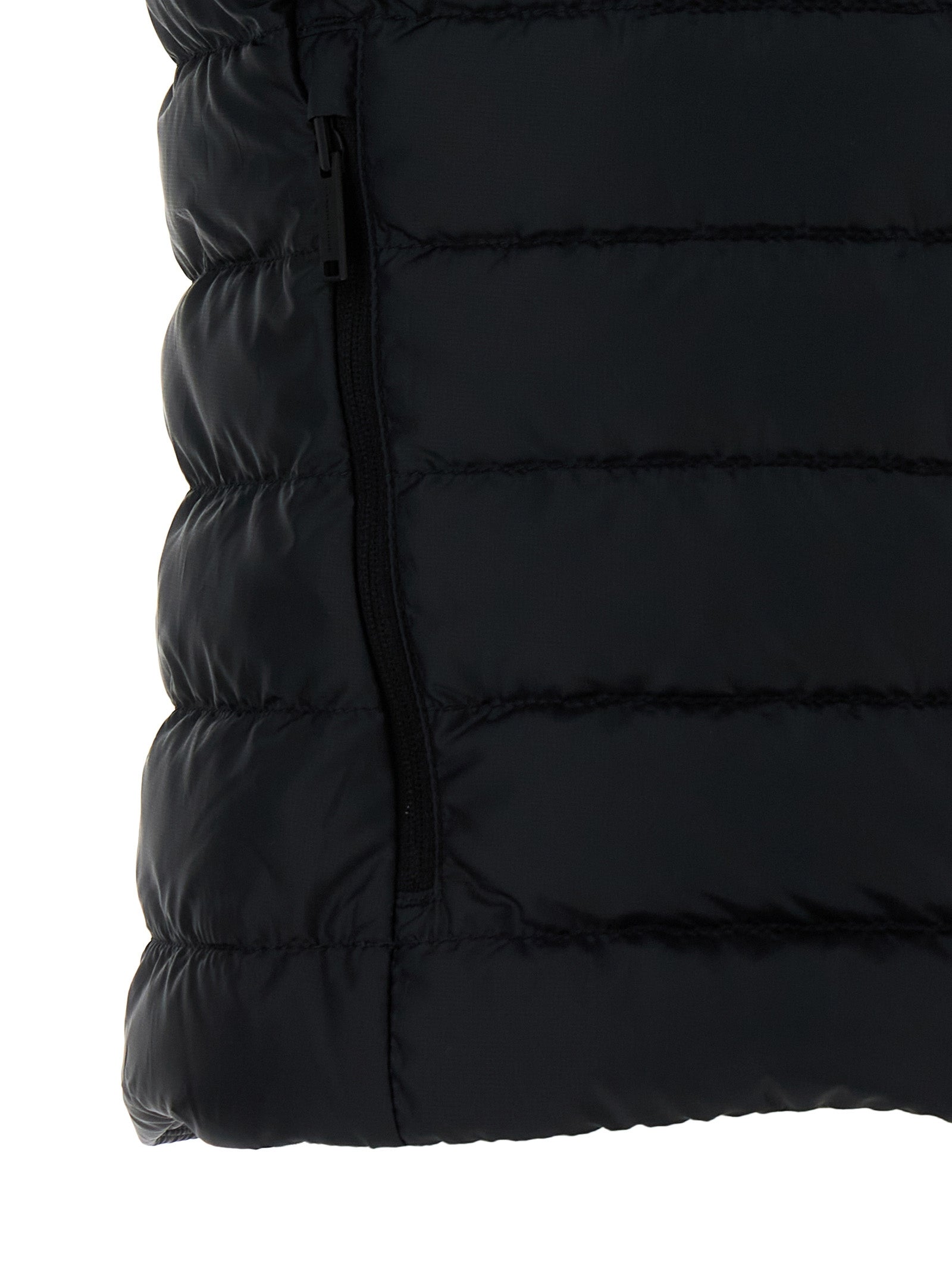 Veste sans manches en polyamide noire de Canada Goose, coupe-vent et légère, adaptée pour la saison froide.