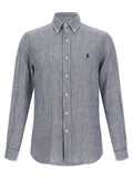 Chemise en lin bleu Polo Ralph Lauren, blouse élégante avec col et manches longues, tissu léger et respirant.