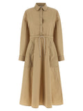 Robe longue beige en polyester de la marque Moncler, avec coupe élégante et détails sophistiqués visible sur l'image.