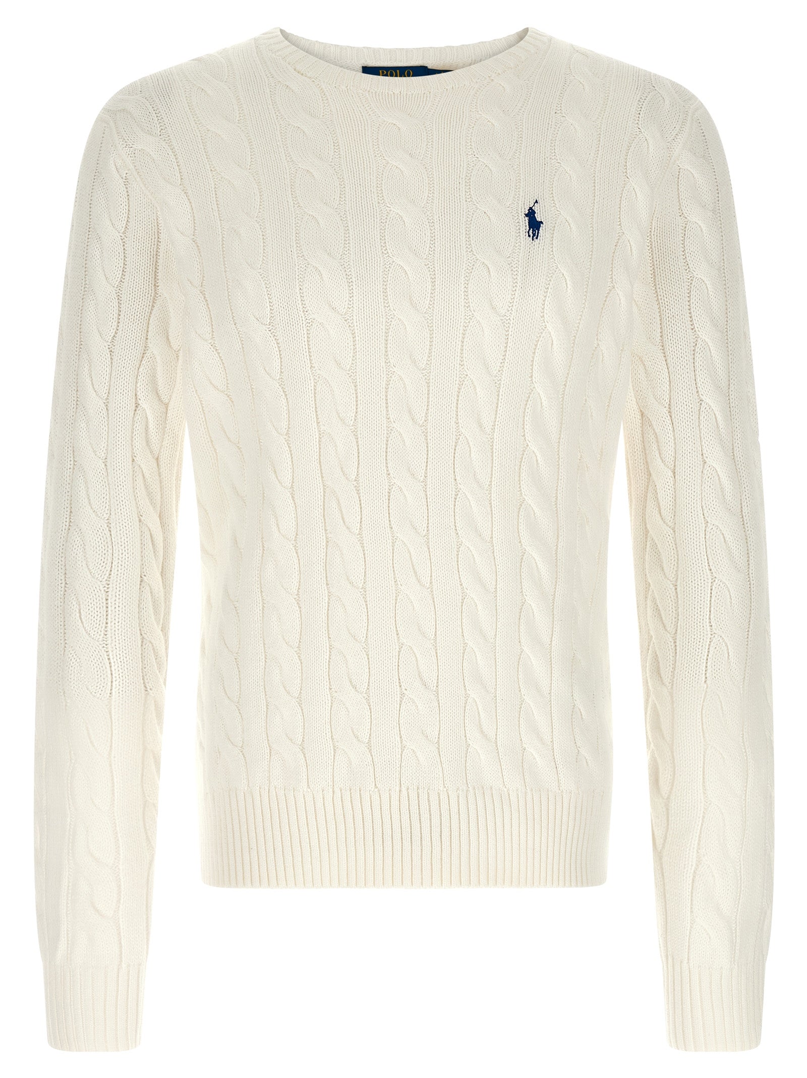 Cardigan en coton blanc de Polo Ralph Lauren porté, avec col en V et boutons, style classique et élégant.