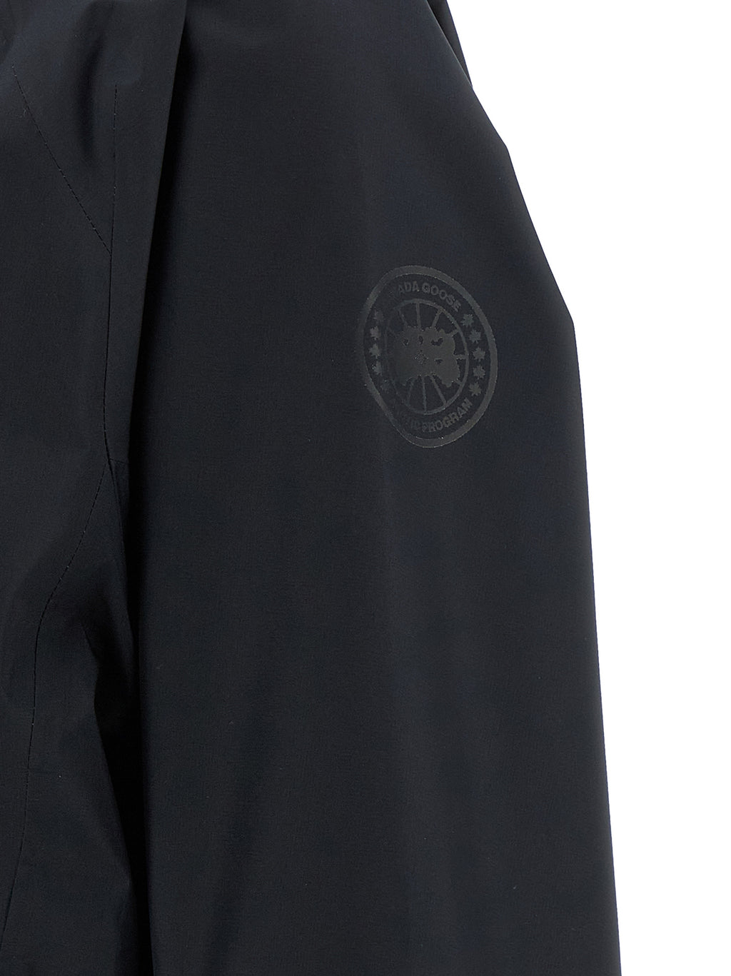 Veste en polyester noire Canada Goose pour homme, coupe-vent et résistante aux intempéries, avec capuche amovible et fermeture éclair.