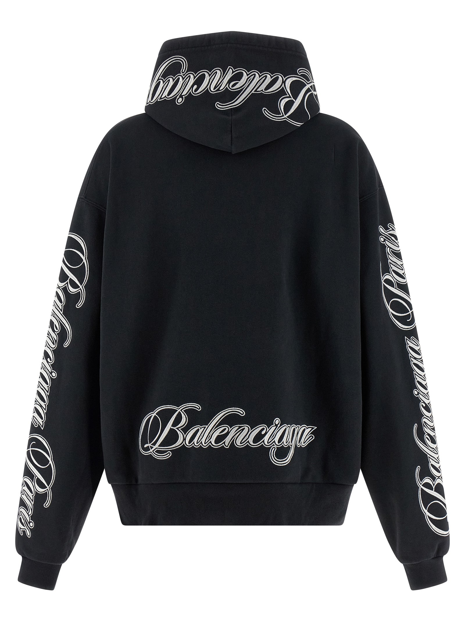 Pull à capuche en coton noir Balenciaga, décontracté avec logo discret, porté par un modèle sur fond neutre.