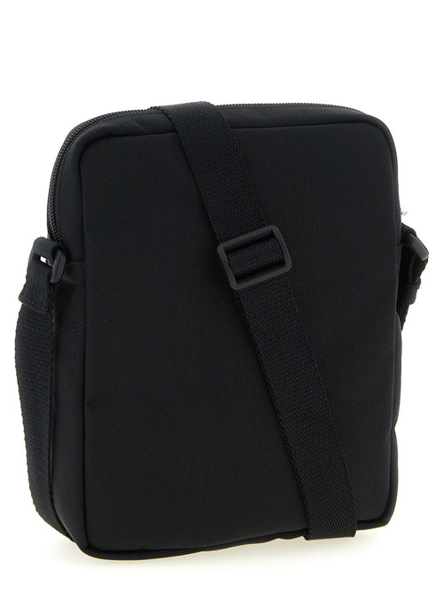 Sac bandoulière Balenciaga noir en polyamide, vue détaillée du design élégant et des matériaux durables.
