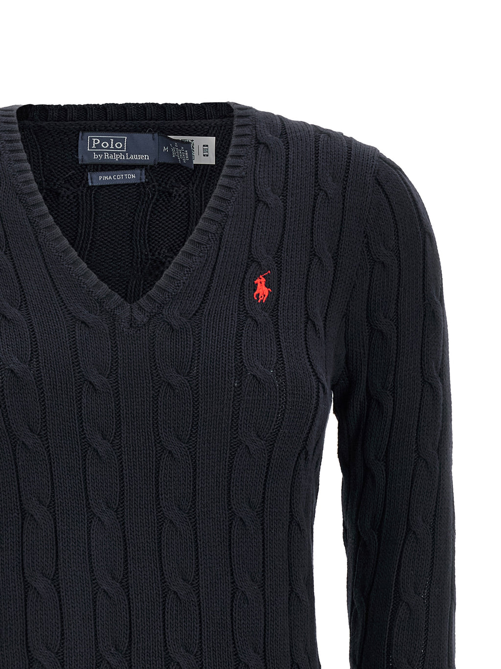 Cardigan en coton bleu Polo Ralph Lauren porté sur un mannequin, détails du col et des boutons visibles.