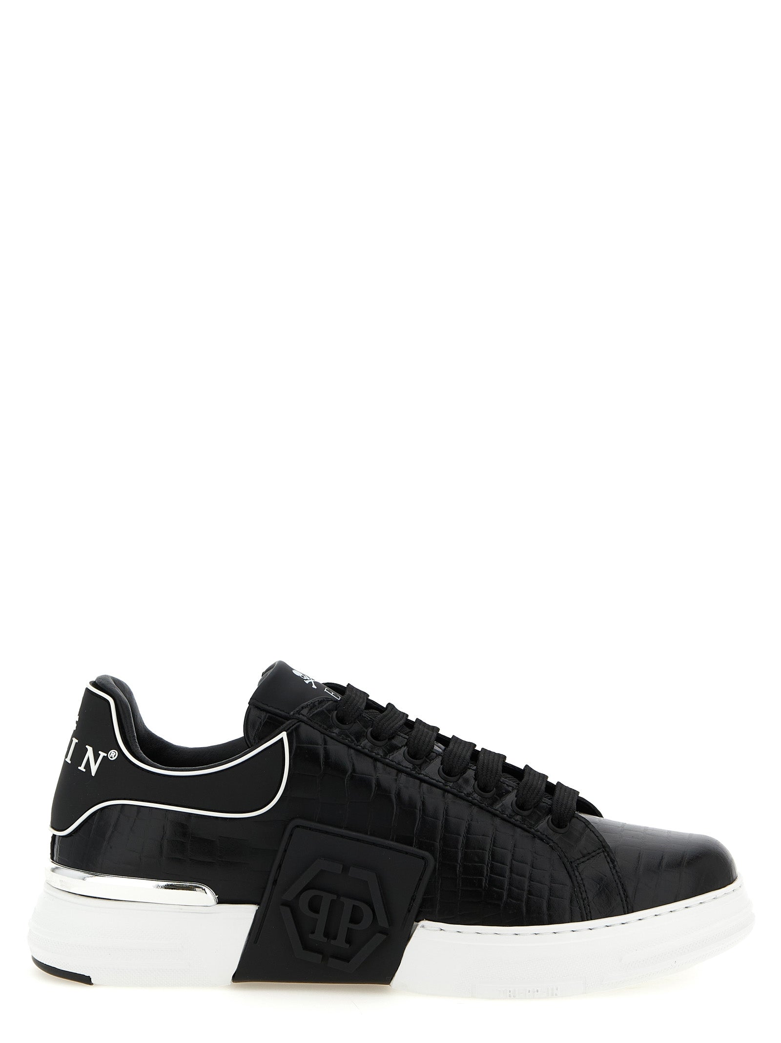 Baskets basses Philipp Plein en cuir de vache noire, style décontracté et tendance, avec détails en relief et logo de la marque.