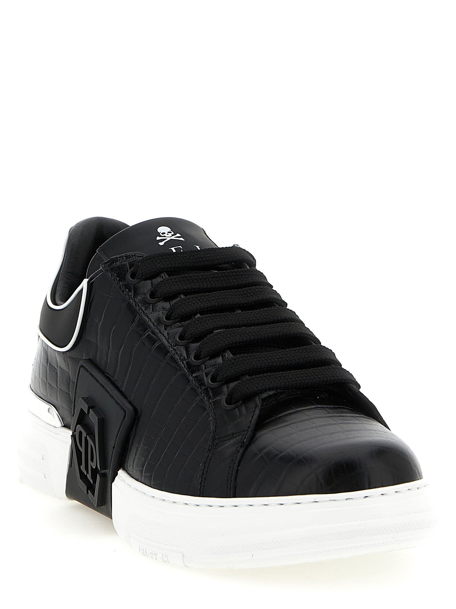 Chaussures basses en cuir de vache noire Philipp Plein, sneakers tendance pour homme avec design moderne.