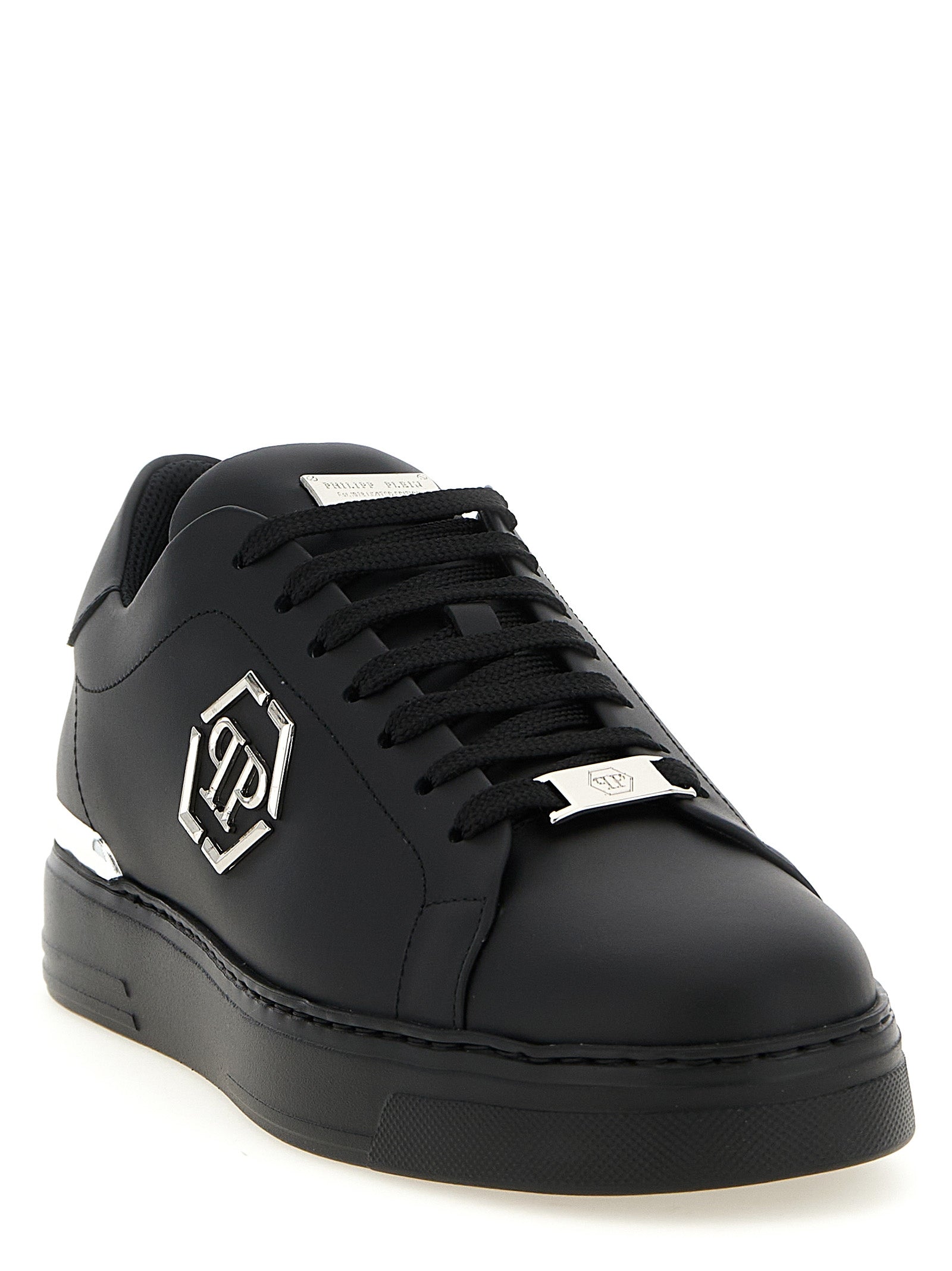 Chaussures Philipp Plein en cuir de veau noir, baskets basses élégantes avec logo distinctif, pour un style moderne et sophistiqué.