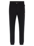 Pantalons de jogging en coton noir Philipp Plein, style décontracté, avec logo sur la jambe, pour homme ou femme.