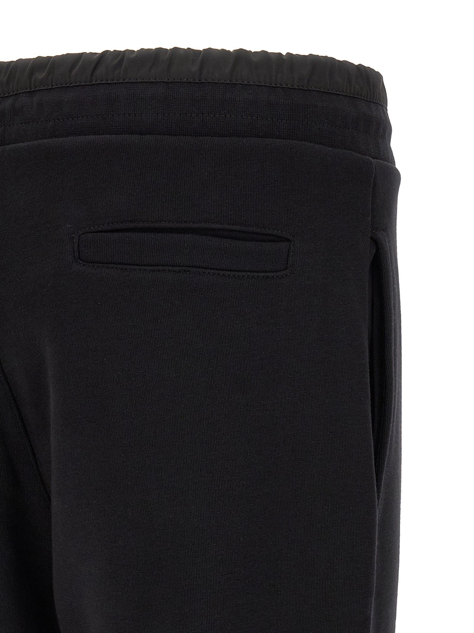 Pantalons de jogging en coton noir Philipp Plein pour homme, style décontracté et confortable pour l'entraînement ou la détente.