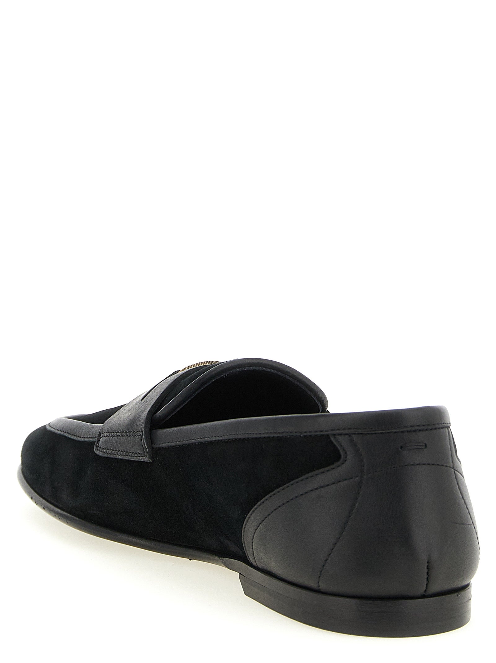 Chaussures mocassins Dolce & Gabbana en cuir de veau noir, sans lacets, style slip-on pour homme élégante et sophistiquée.