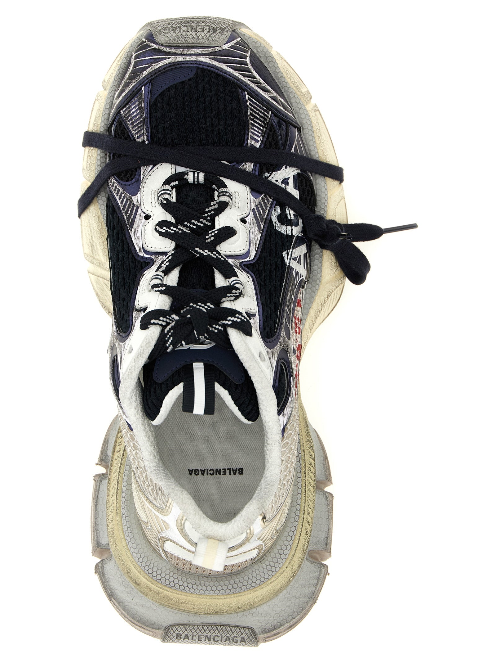 Chaussures de sport Balenciaga multicolores en polyethylene, baskets athlétiques tendance, visibles en image.
