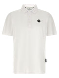 Chemise polo blanche en coton Philipp Plein avec logo brodé, portée sur un mannequin.
