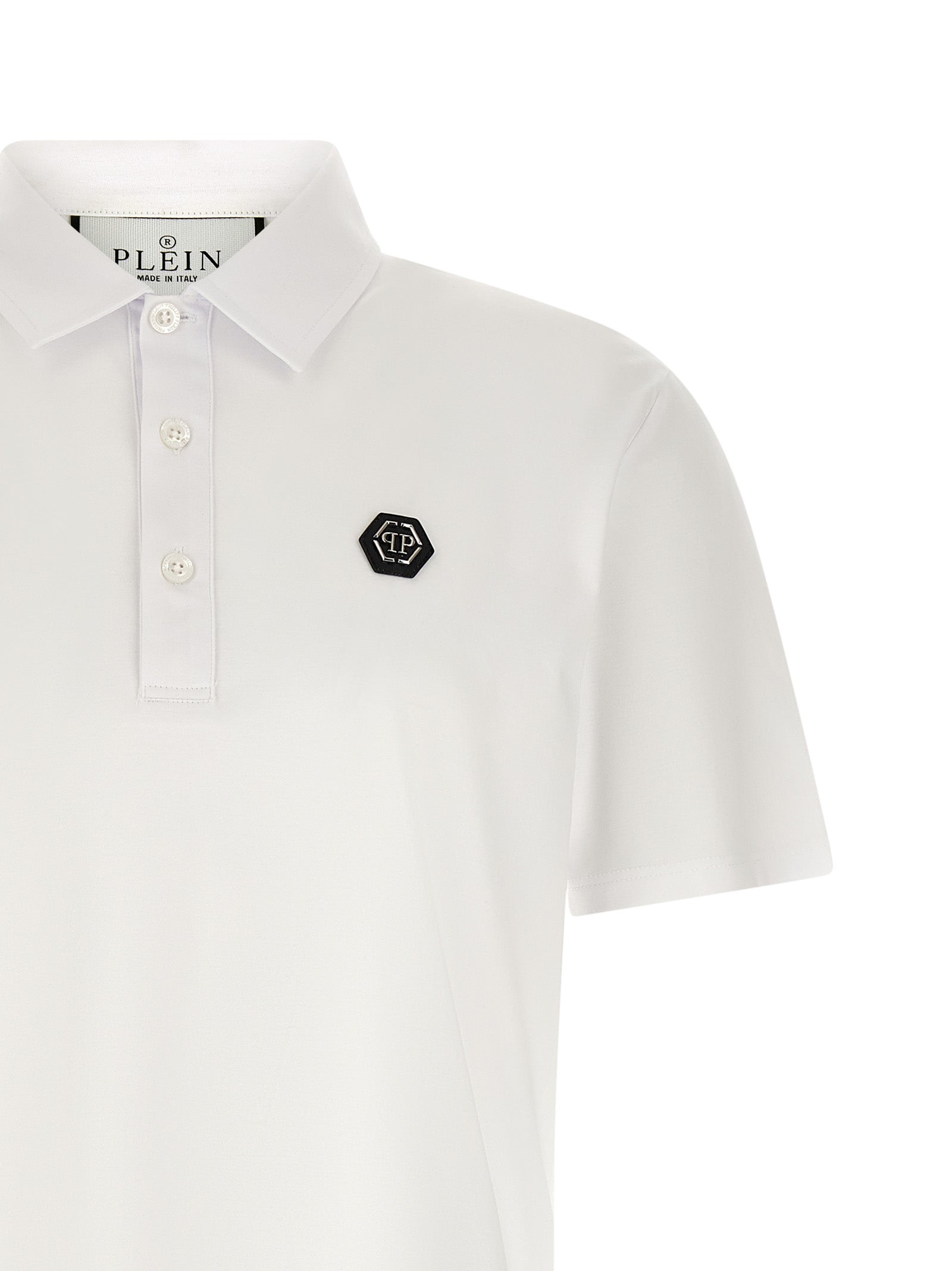 Chemise polo blanche en coton de la marque Philipp Plein, col classique et logo brodé sur la poitrine.