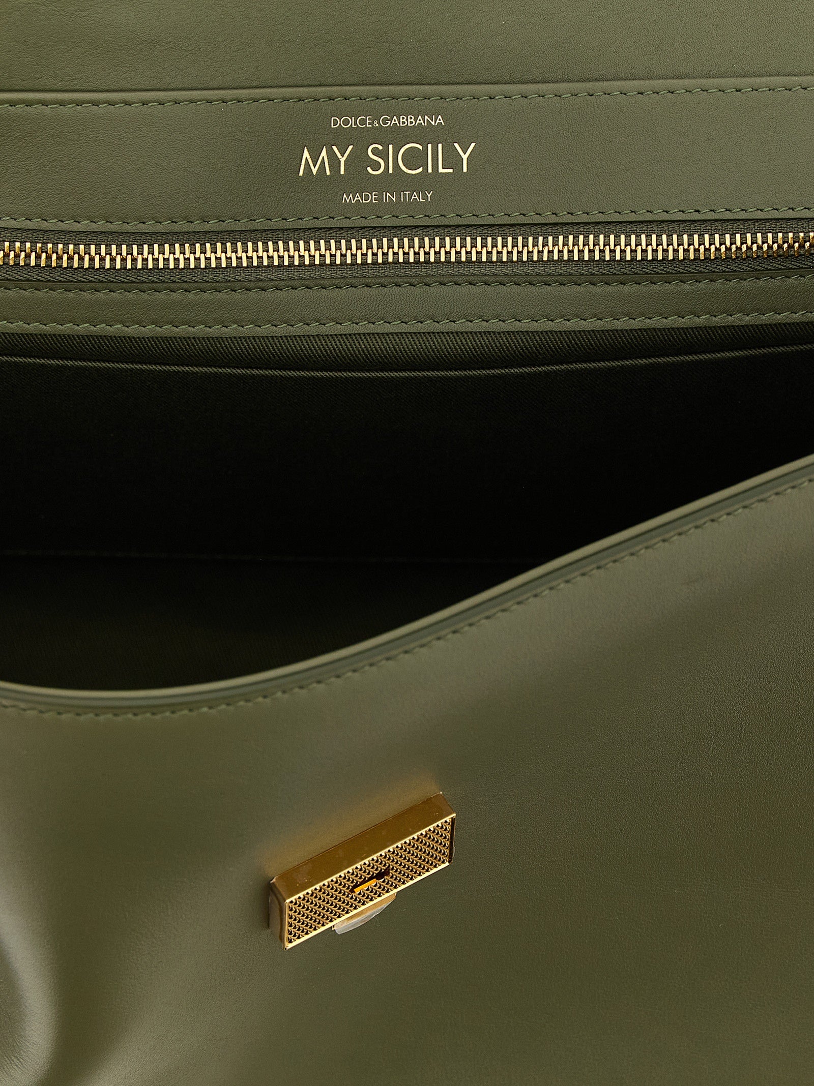 Sac à main Dolce & Gabbana en cuir de veau bicolore, élégant et sophistiqué, avec poignées et détails raffinés.