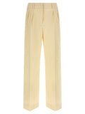 Pantalon beige en coton de Moncler, pantalons élégants pour homme, vue de face avec détails du tissu et coupe ajustée.