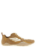 Chaussures de sport Balenciaga en polyester beige, baskets athlétiques modernes et confortables, vue en gros plan.