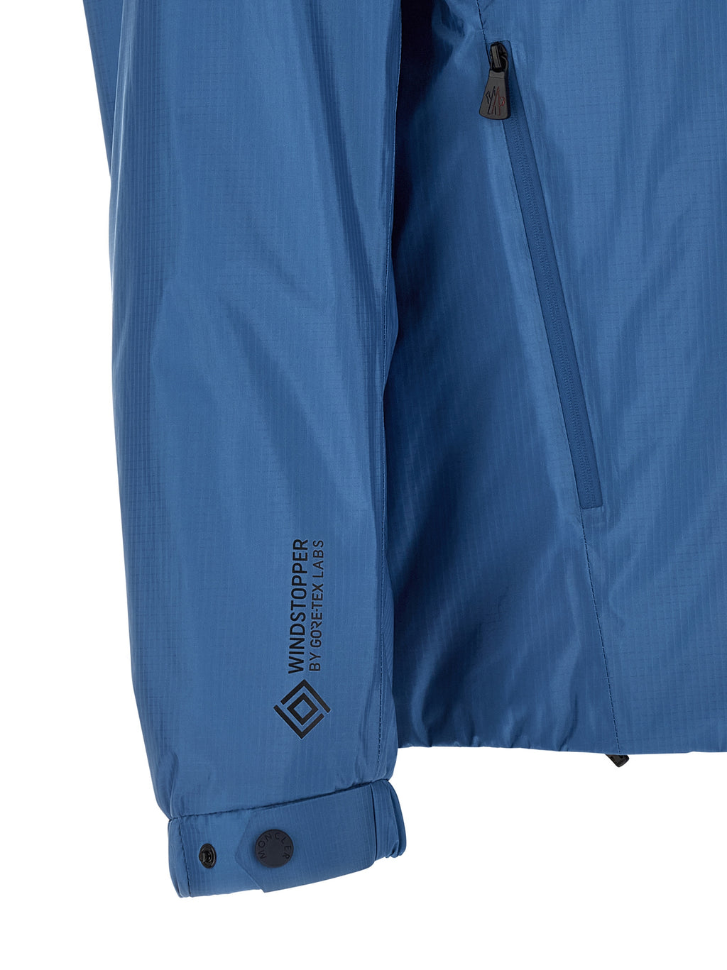 Veste en shell en polyamide bleue Moncler Grenoble, coupe-vent et imperméable, avec capuche et fermeture éclair.