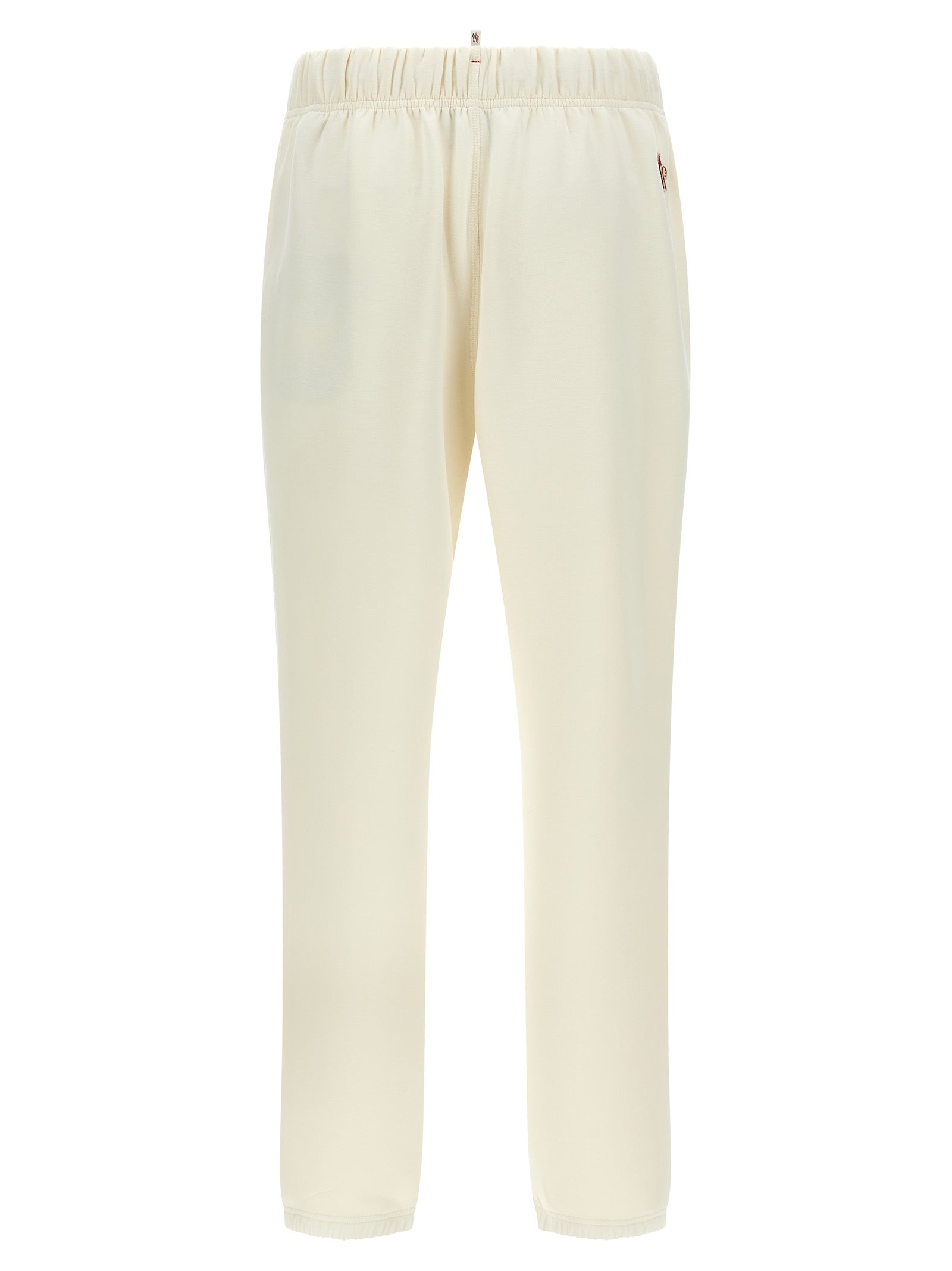 Pantalons de jogging en polyester blanc Moncler Grenoble pour homme, coupe décontractée et confortable.