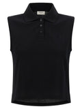Polo en coton noir de Saint Laurent avec col classique et logo discret, porté sur un mannequin.