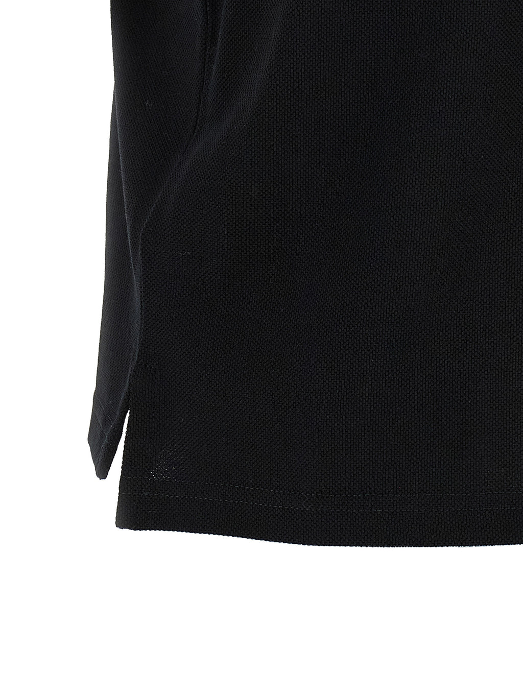 Chemise polo en coton noir de Saint Laurent, élégante et décontractée, avec col classique et logo discret.