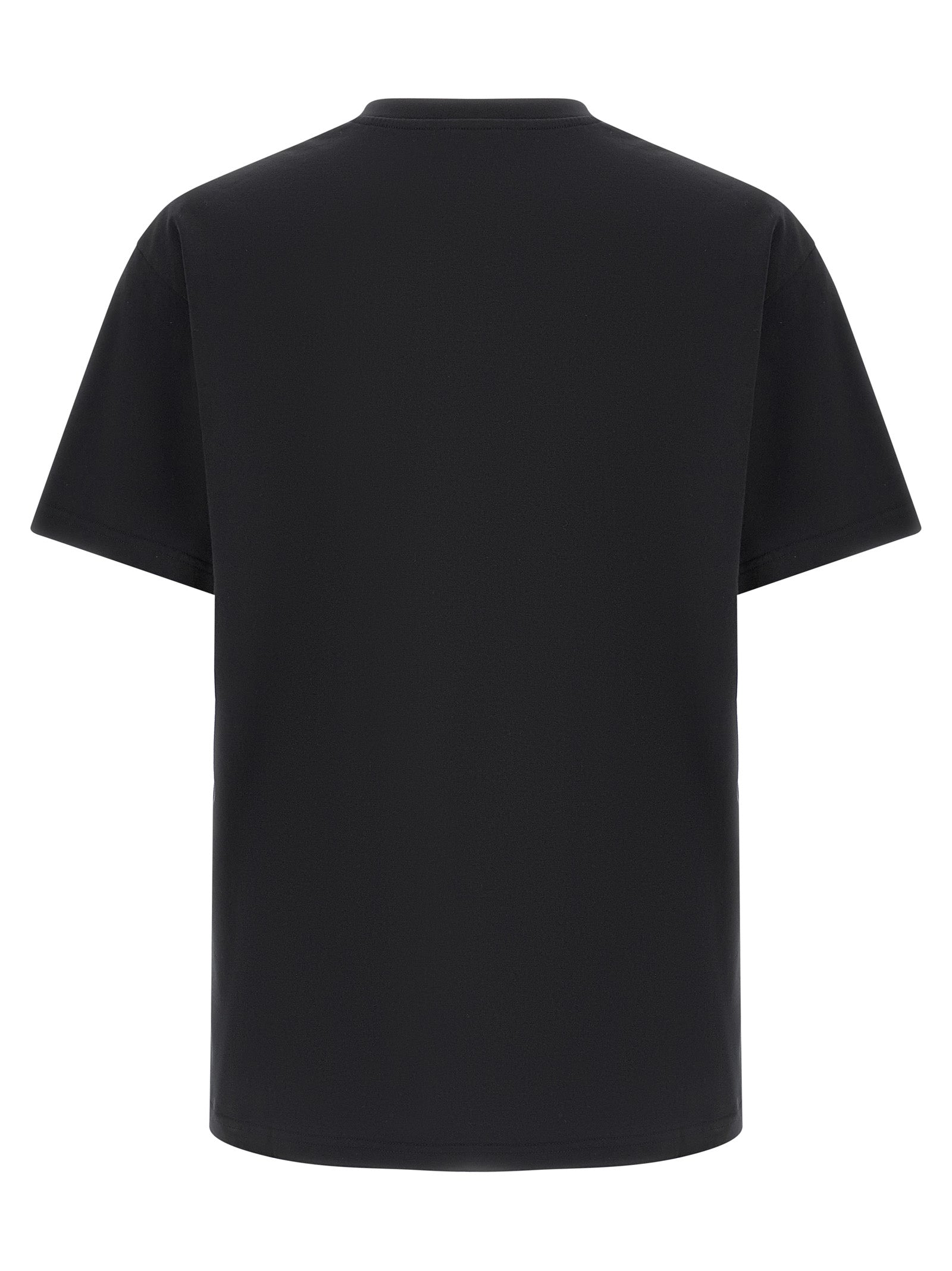 T-shirt noir en coton Givenchy, coupe classique, avec logo discret sur la poitrine, porté sur un mannequin.