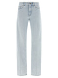 Jeans droits en coton bleu de la marque Givenchy, vue de face avec détails de la coupe et de la texture du tissu.