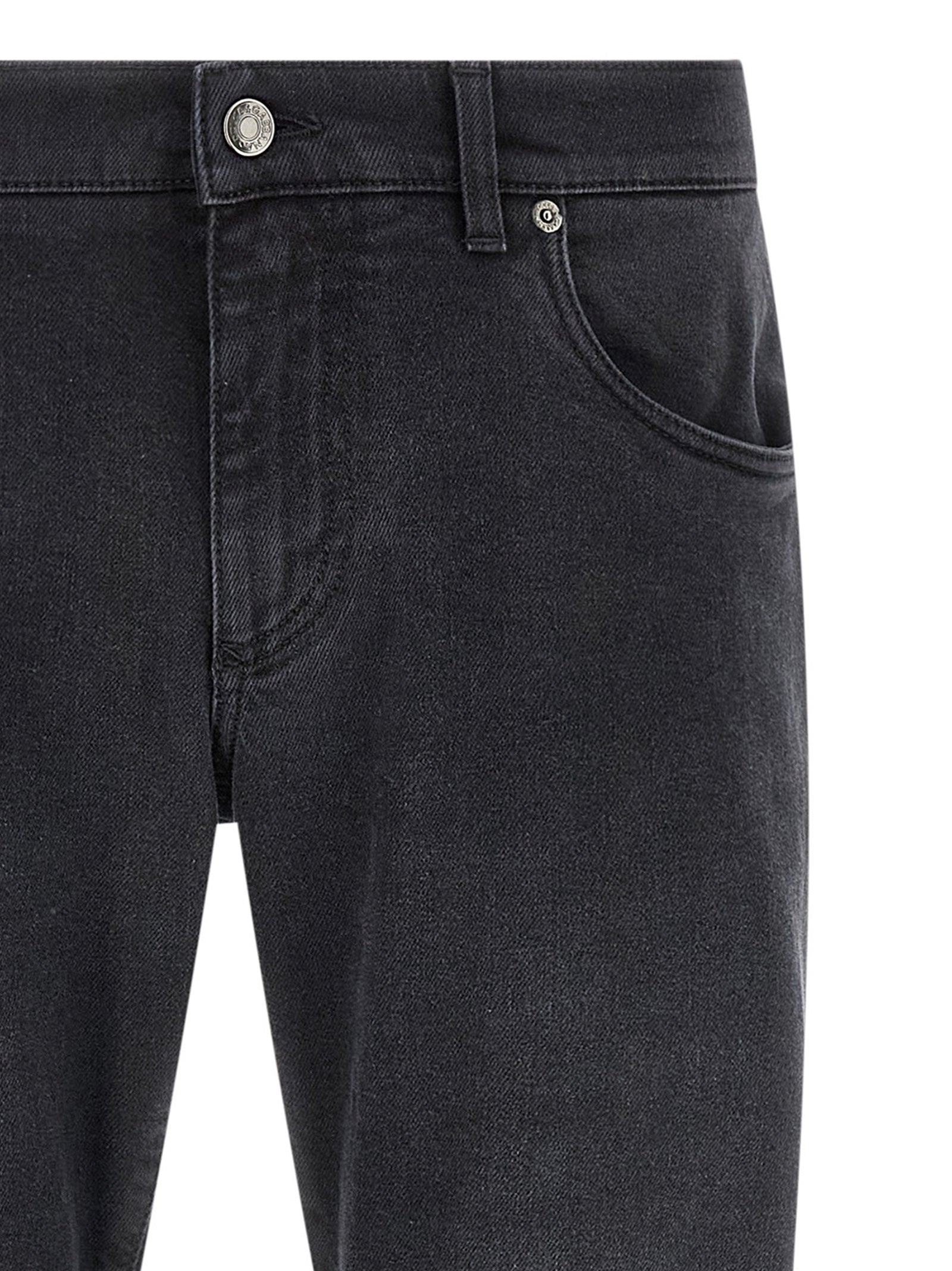 Jeans droits en coton noir Dolce & Gabbana, style classique et ajusté, avec détails de couture visibles.