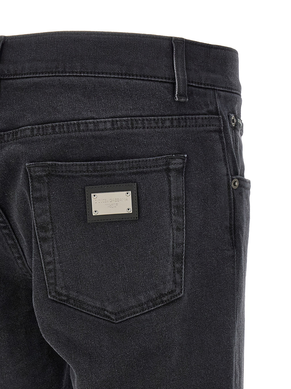 Jeans droits en coton noir de Dolce & Gabbana, style classique et coupe ajustée, visibles en détail dans cette image.