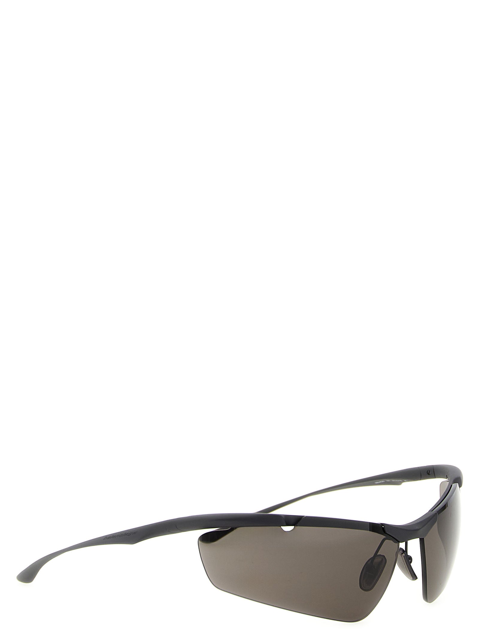 Lunettes de soleil Balenciaga en polyamide noir avec monture élégante, visibles sur l'image.