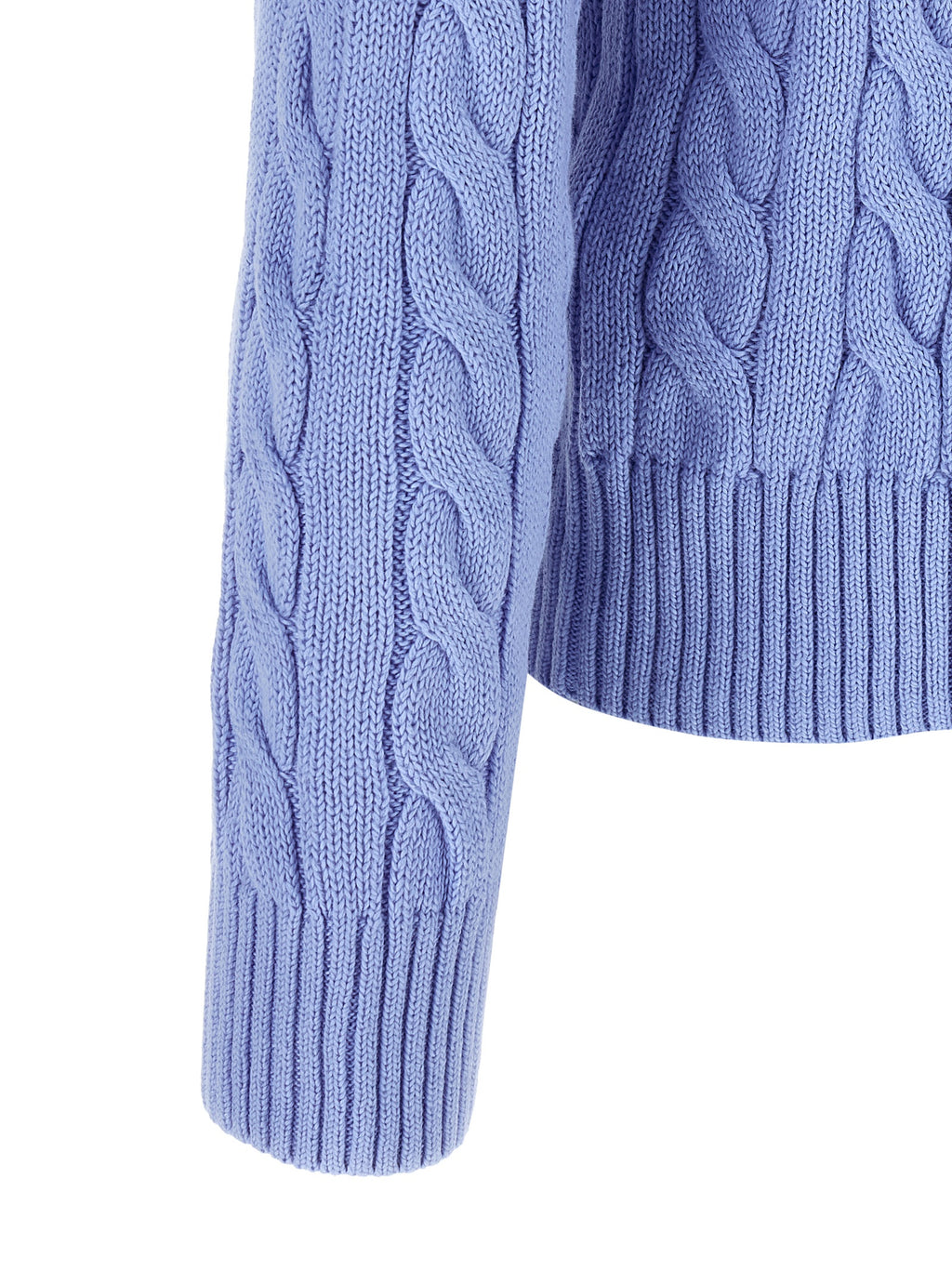 Cardigan en coton bleu Polo Ralph Lauren avec col en V et boutons, porté dans une tenue décontractée.