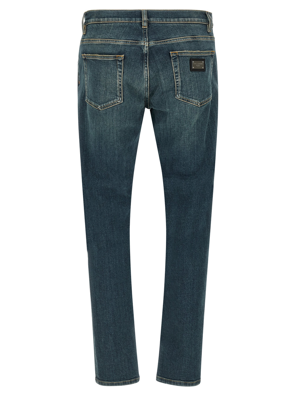 Jeans slim en coton bleu Dolce & Gabbana, coupe ajustée, détails modernes, porté avec style et confort.
