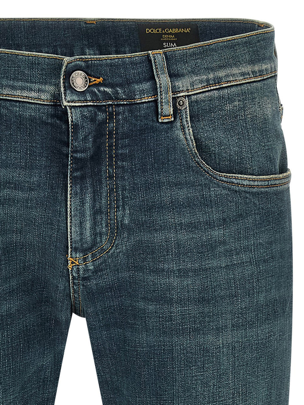 Jeans slim en coton bleu Dolce & Gabbana, coupe ajustée, détails classiques et style élégant.