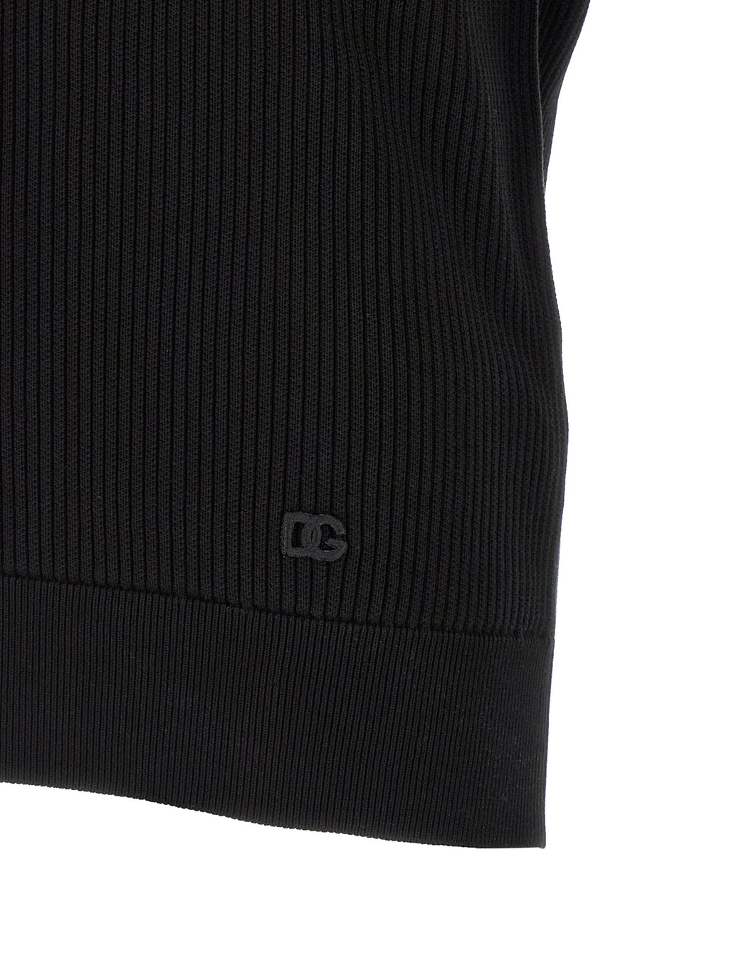 Chemise polo en coton noir Dolce & Gabbana, vue de face, avec col classique et logo discret sur la poitrine.