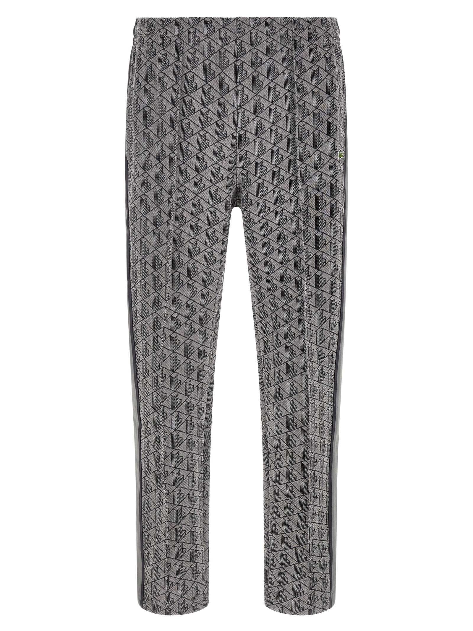 Pantalons de jogging gris en polyester de Lacoste, style décontracté pour l'entraînement ou le confort quotidien.