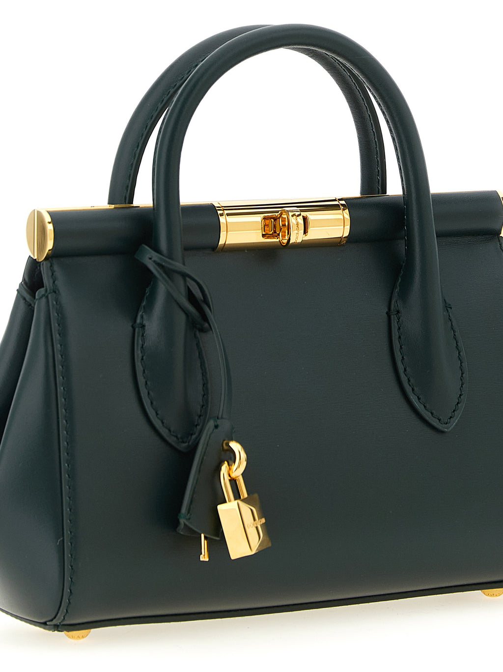 Sac à main Dolce & Gabbana en cuir de veau bicolore, élégant et sophistiqué, avec détails raffinés et fermeture métallique.