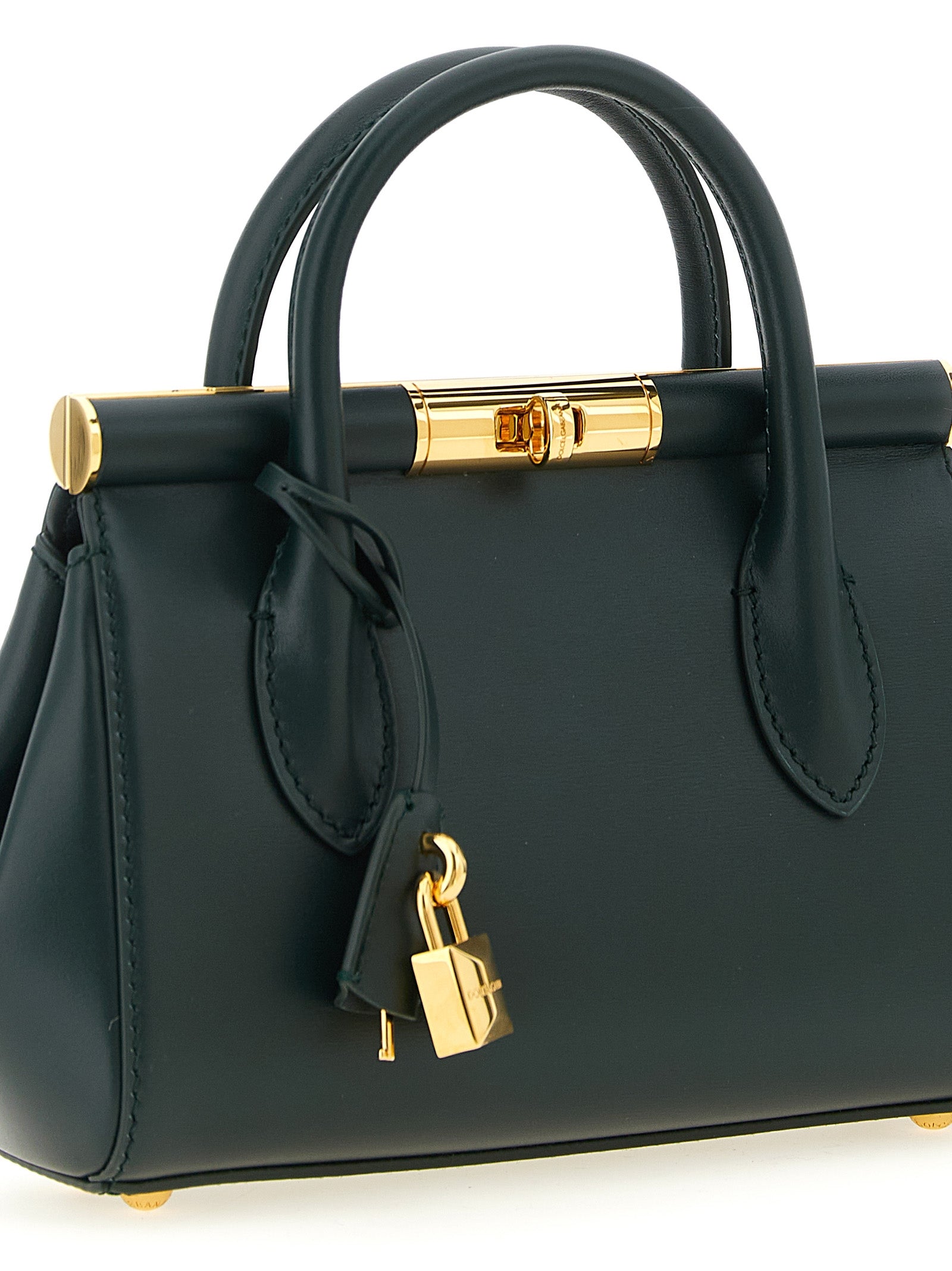 Sac à main Dolce & Gabbana en cuir de veau bicolore, élégant et sophistiqué, avec détails raffinés et fermeture métallique.