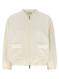 Cardigan blanc en polyester de la marque Moncler, doux et élégant, porté sur un mannequin.