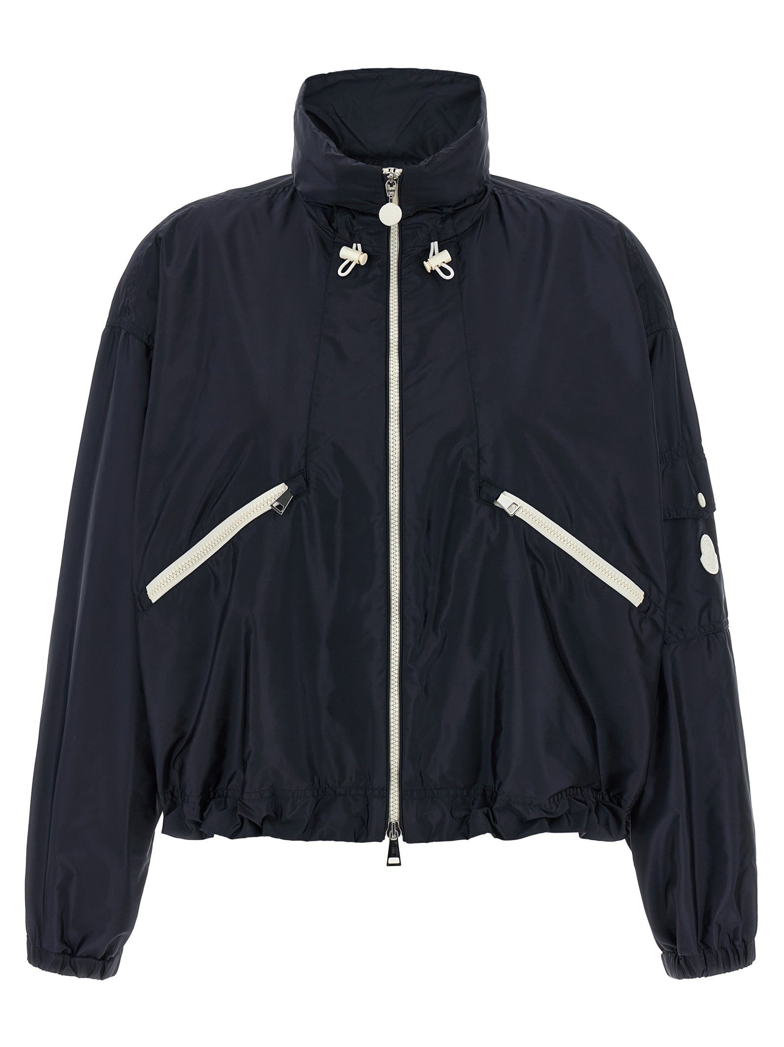 Veste Moncler en polyamide bleu, coupe-vent et légère, avec capuche et fermeture zippée, adaptée pour la saison hivernale.