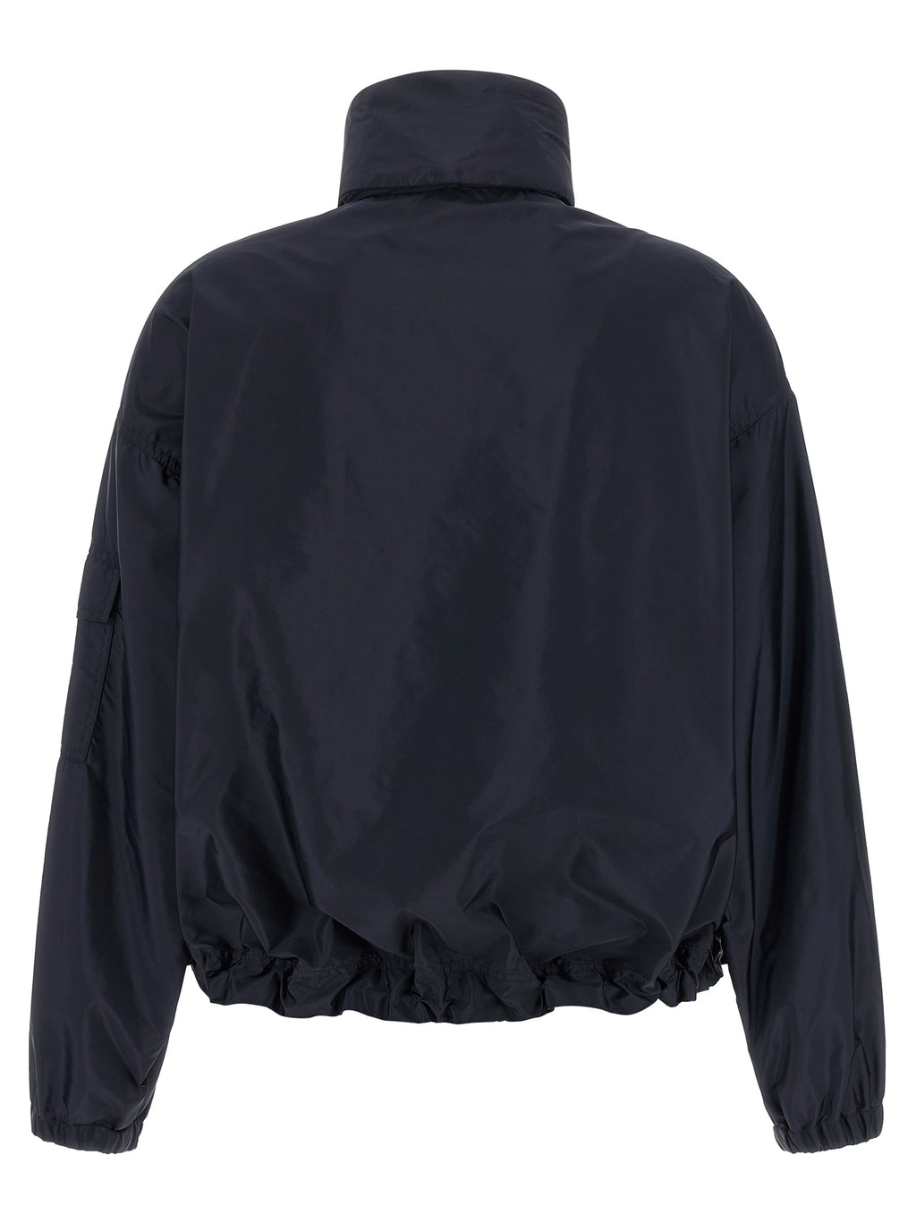 Veste en shell en polyamide bleu Moncler, légère et imperméable, avec capuche et fermeture zippée visible sur l'image.