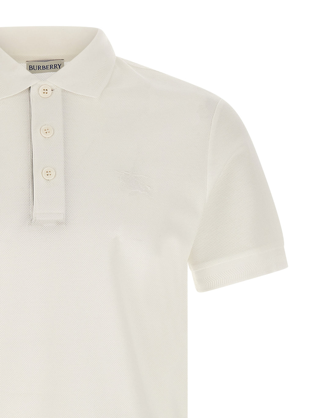 Chemise polo blanche en coton de Burberry, à col classique et logo discret, pour un style élégant et décontracté.