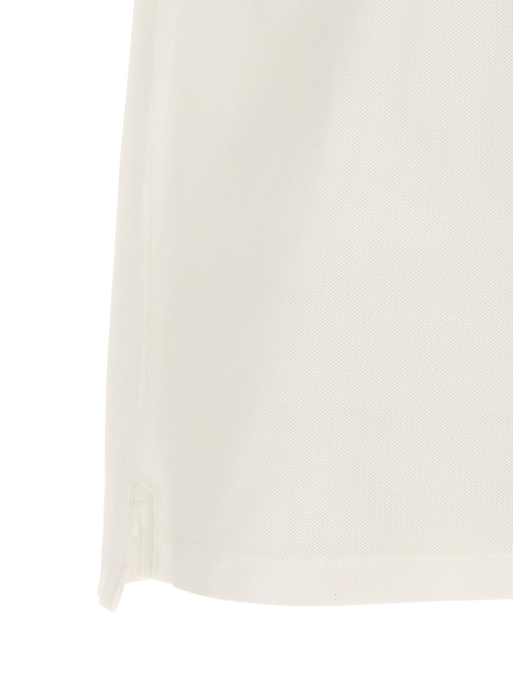 Chemise polo blanche en coton Burberry, vue de face, avec col classique et logo emblématique visible.