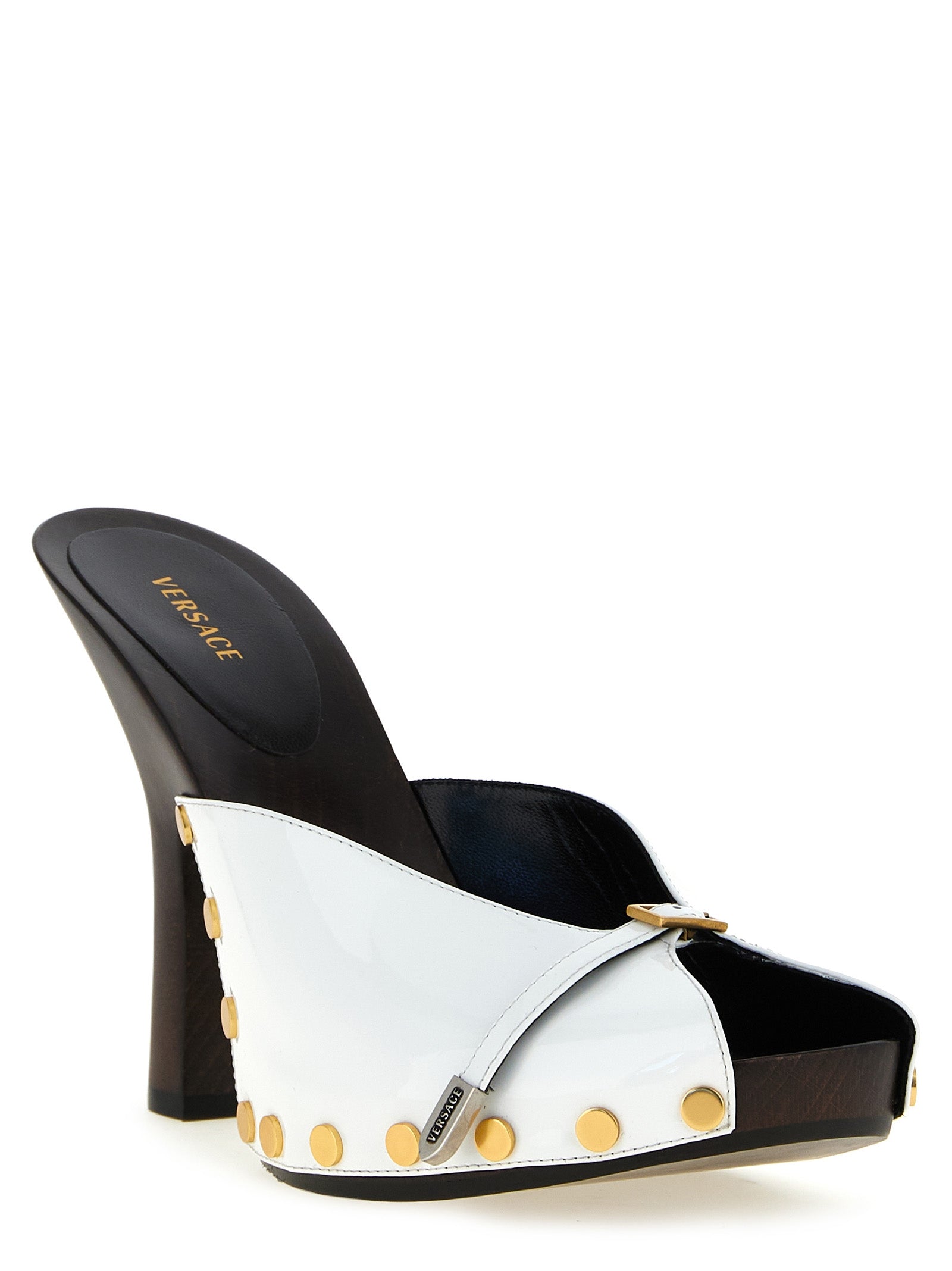 Escarpins haut de gamme Versace en cuir bicolore pour femmes, avec talons hauts élégants et design sophistiqué.