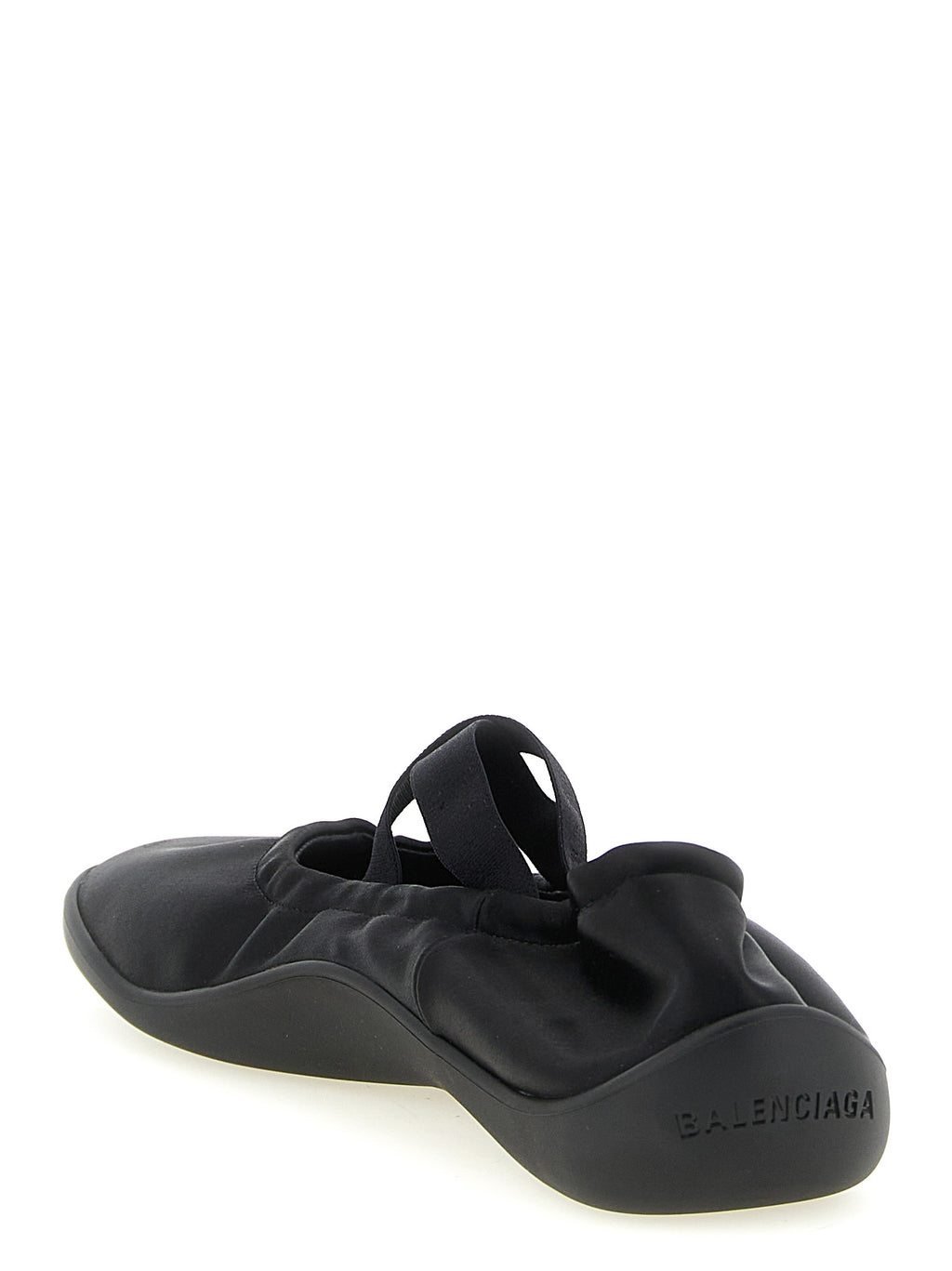 Chaussures ballerines en polyester noir de Balenciaga, design élégant et moderne, visibles en gros plan.