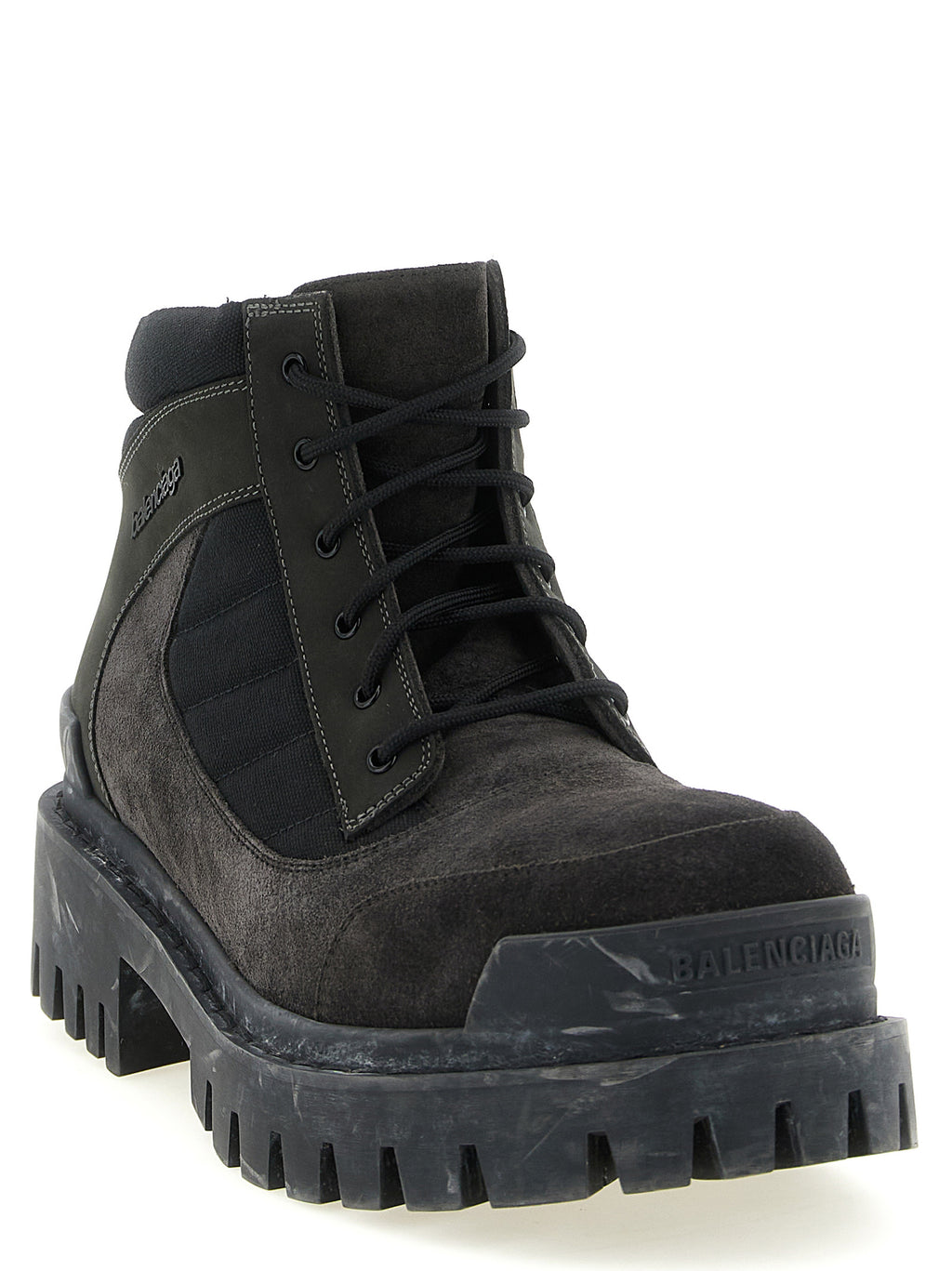 Bottes ankle en cuir de veau marron Balenciaga, élégantes et modernes, avec une finition soignée et une semelle en caoutchouc.