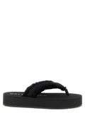 Sandales Balenciaga noires en viscose avec semelle plateforme, vues de face sur un fond neutre.