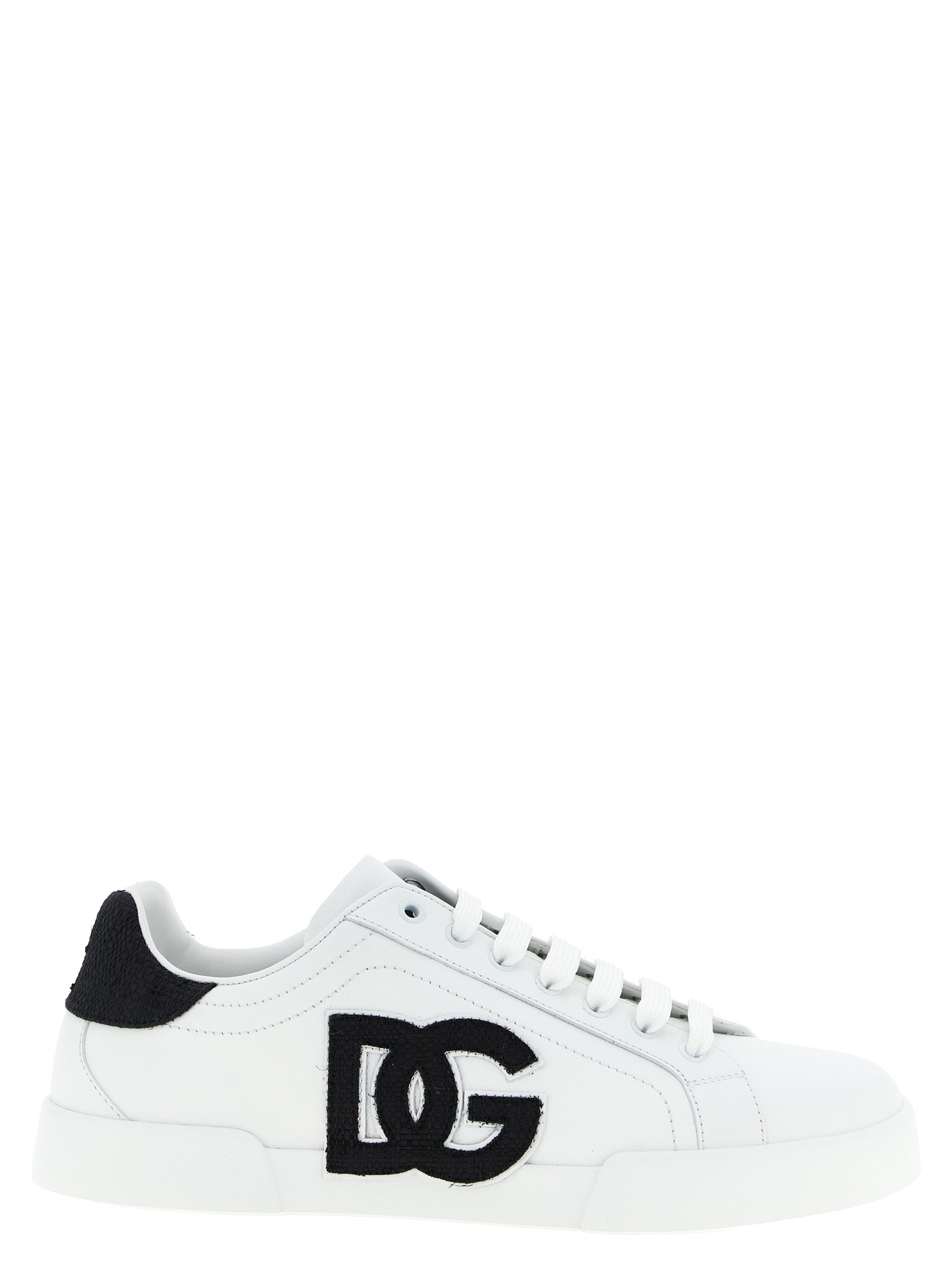 Sneakers basses en cuir bicolore Dolce & Gabbana, chaussures de sport élégantes avec détails en daim et semelle blanche.