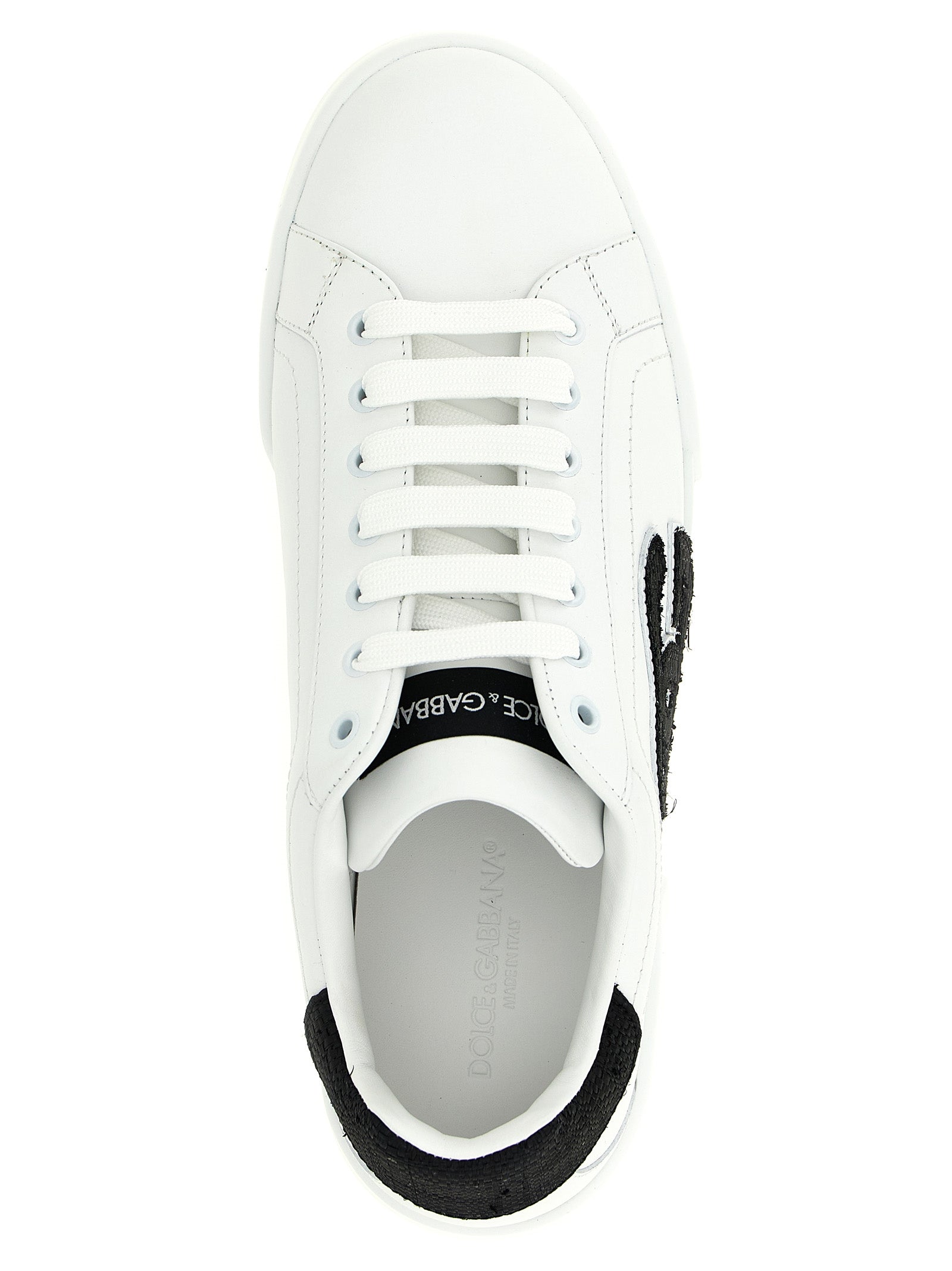 Sneakers basses en cuir bicolore Dolce & Gabbana, chaussures de sport élégantes pour homme, détails en cuir et semelle blanche.