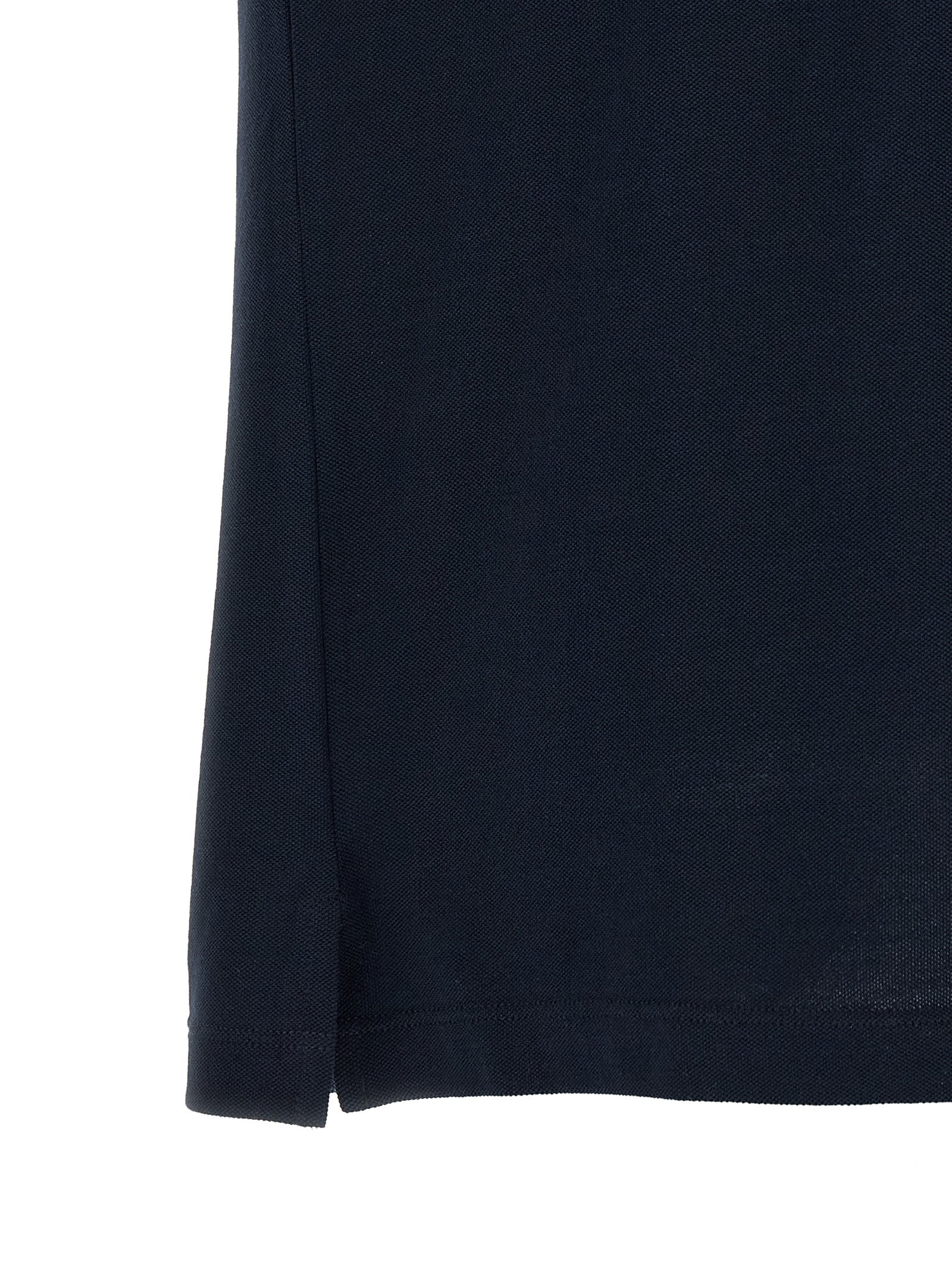 Chemise polo en coton bleu de la marque Fendi, vue de face, détails du col et du logo sur la poitrine.
